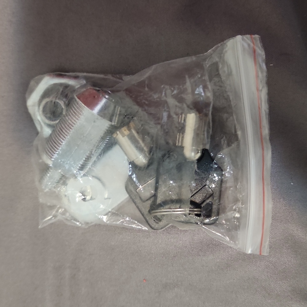 Cupboard drawer lock set
